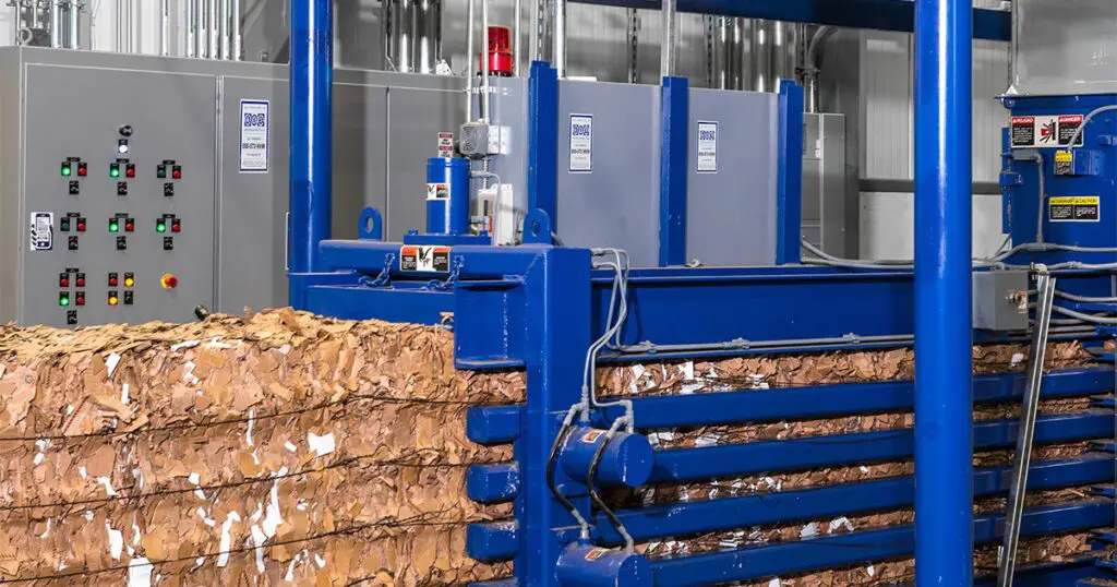 Baler with byproduct